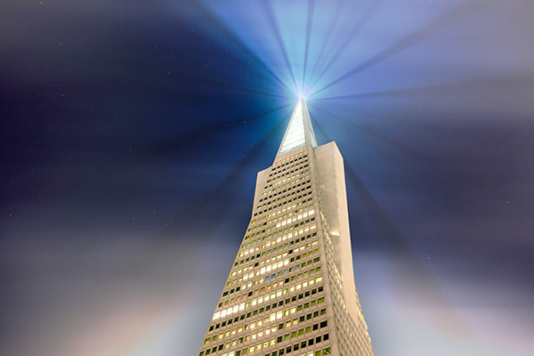 TransAmerica Pyramid illuminated in fog photograph by Shayne Skower